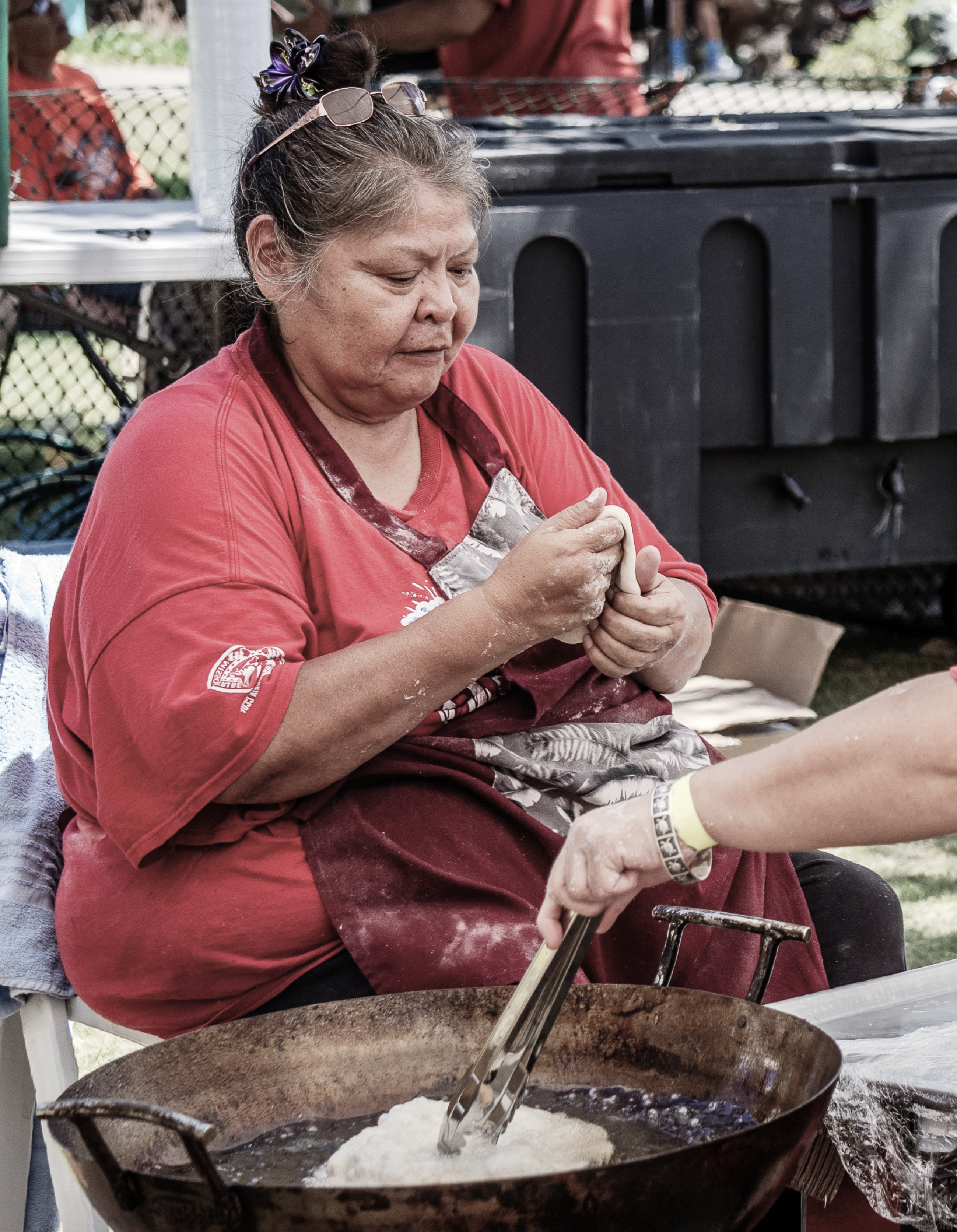 Authentic Navajo frybred chef making frybread at the Annual Honolulu Intertribal Powwow.